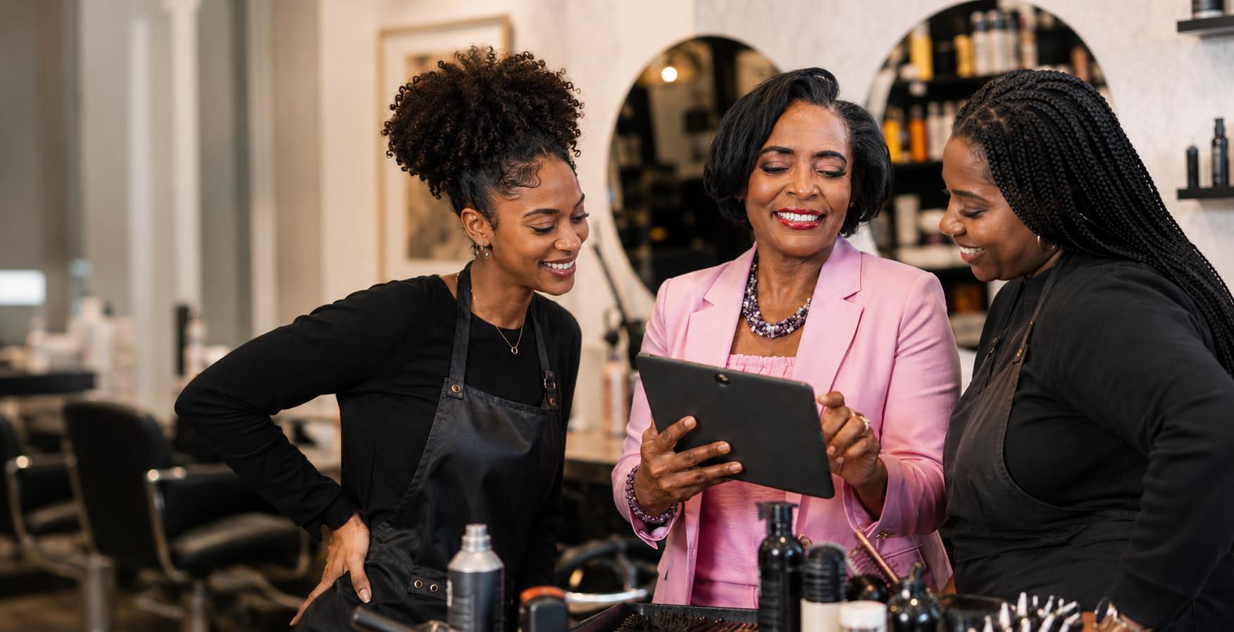 Natasha Simone mentoring beauty professionals in a salon